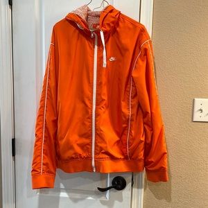 Orange Nike wind breaker